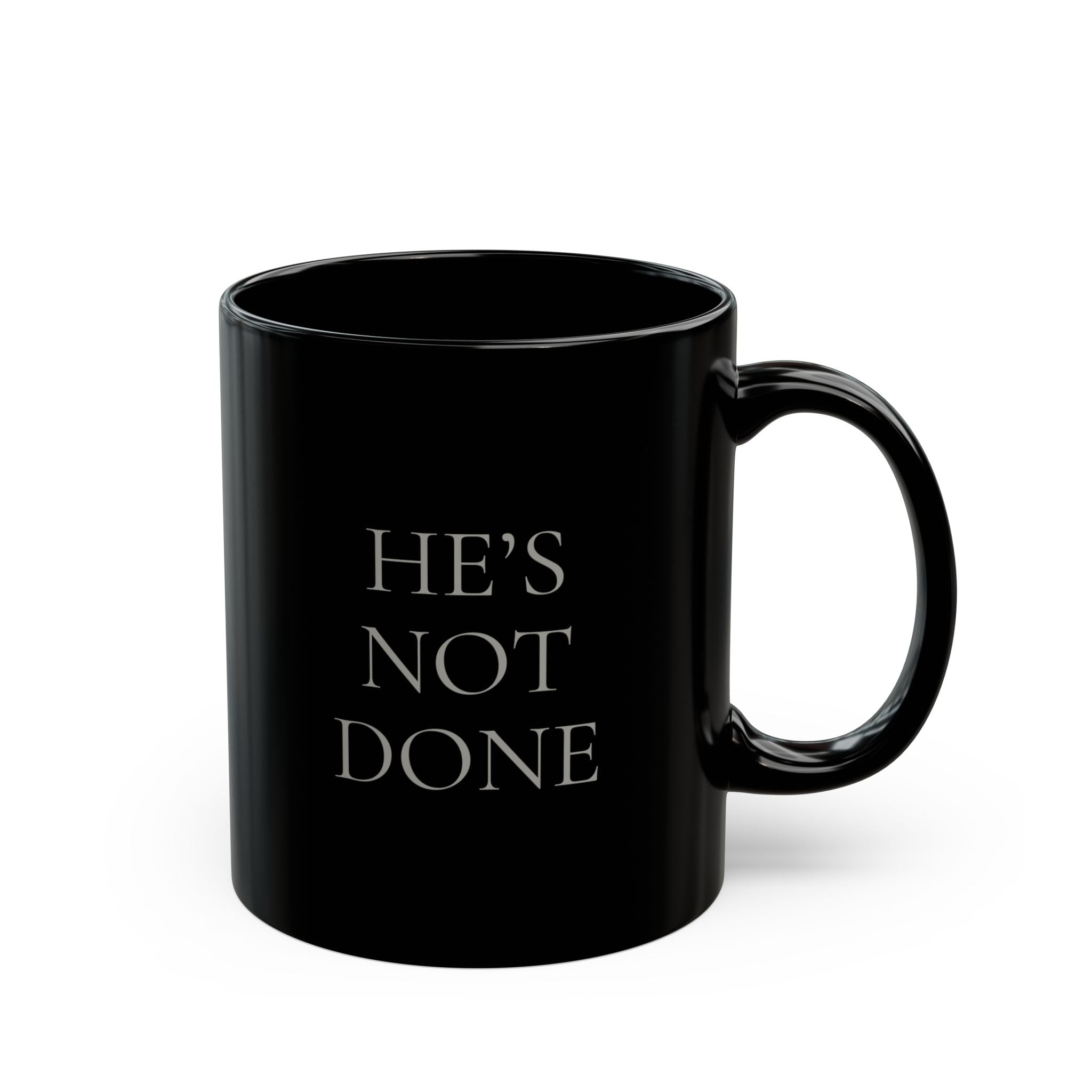He's Not Done Mug
